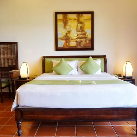 Palm Garden Beach Resort & Spa Hoi An Exteriör bild A bedroom at the resort