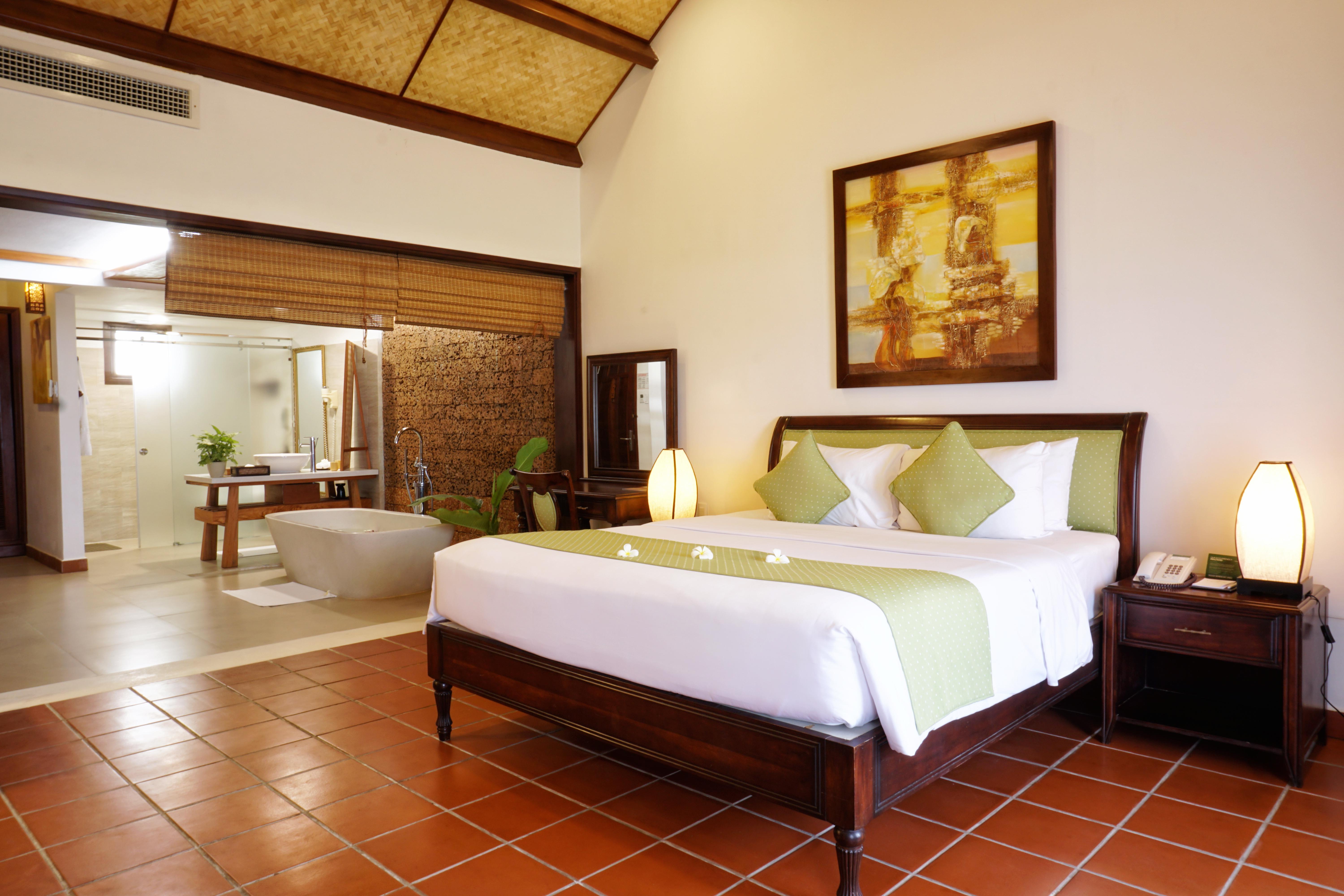 Palm Garden Beach Resort & Spa Hoi An Exteriör bild A bedroom at the resort
