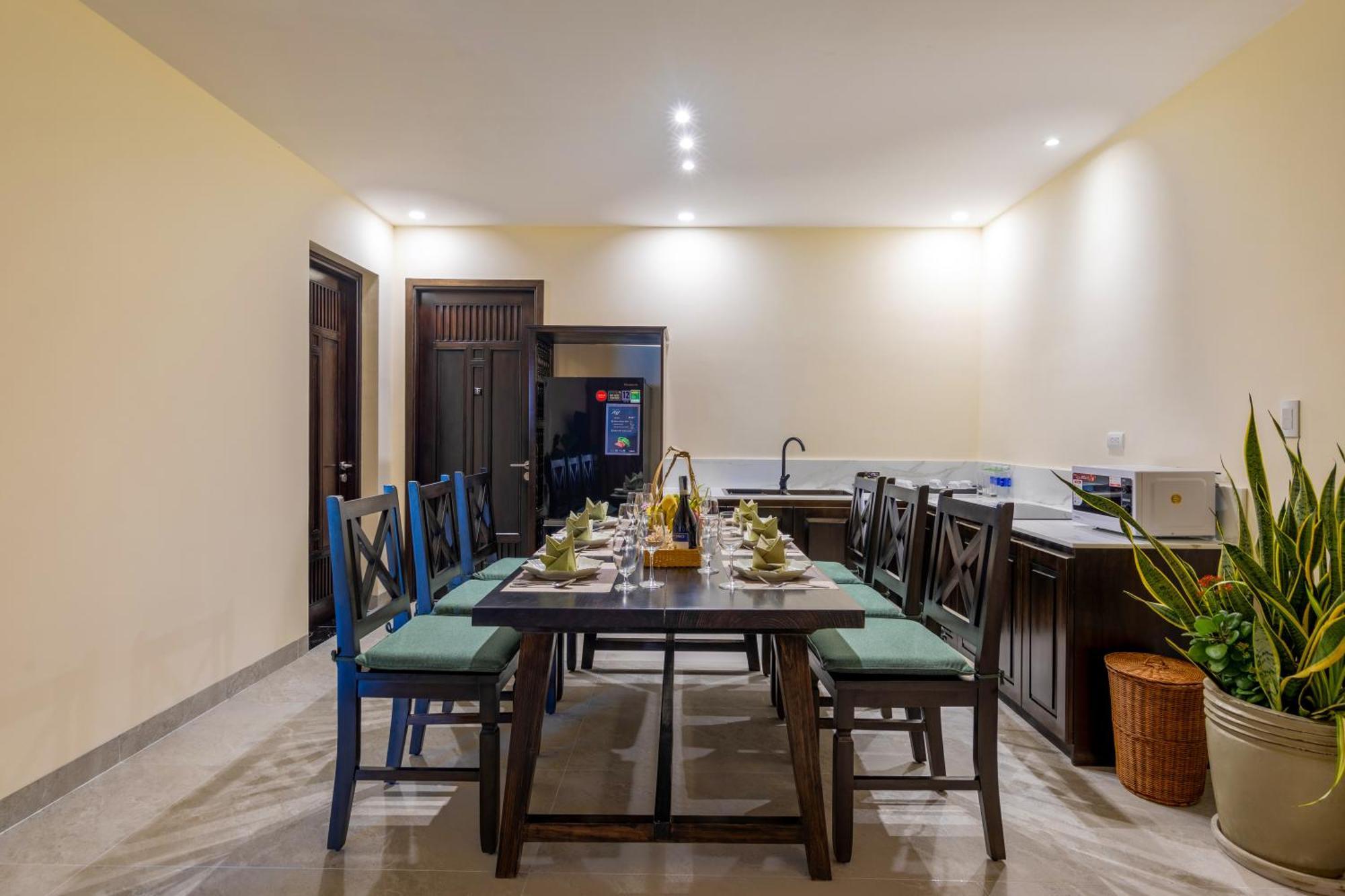 Palm Garden Beach Resort & Spa Hoi An Exteriör bild A kitchen in a serviced apartment in Hanoi, Vietnam