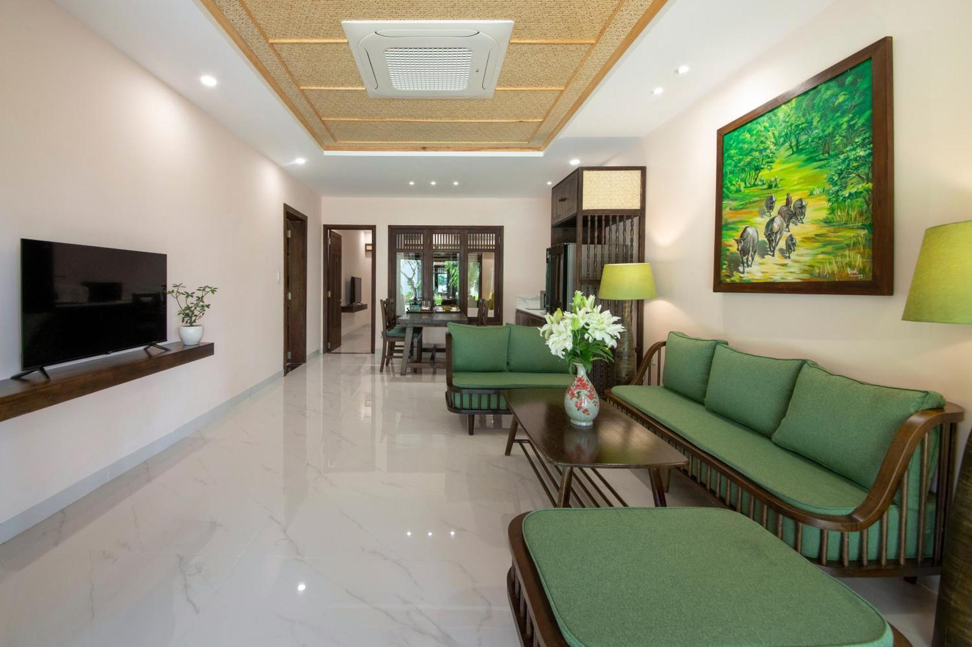 Palm Garden Beach Resort & Spa Hoi An Exteriör bild Interior of a suite at the hotel
